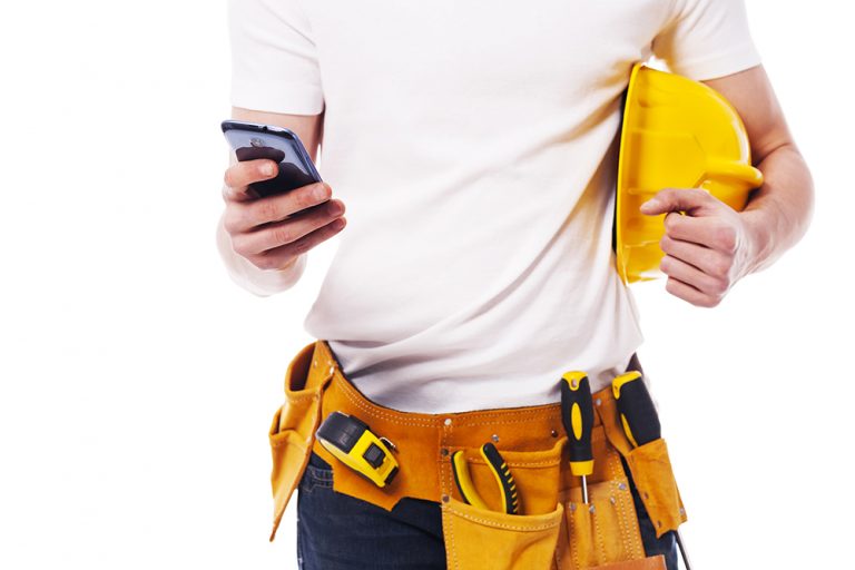 construction worker using a mobile phone