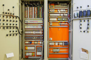 Electricity distribution box with wires and circuit breakers (fuse box)