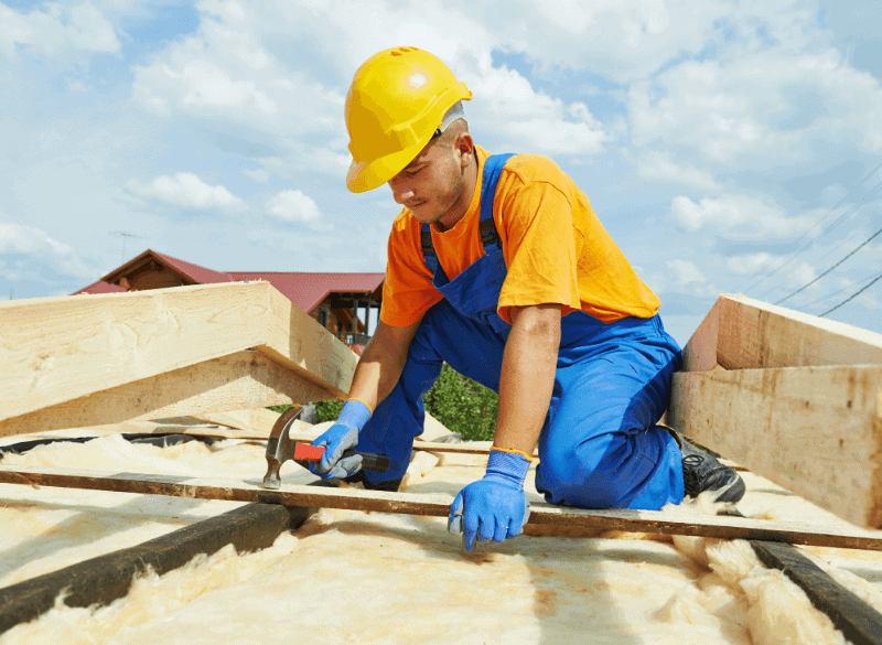 Roofer on roof